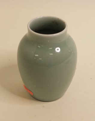 Lot 278 - A Chinese export celadon glazed vase of squat...