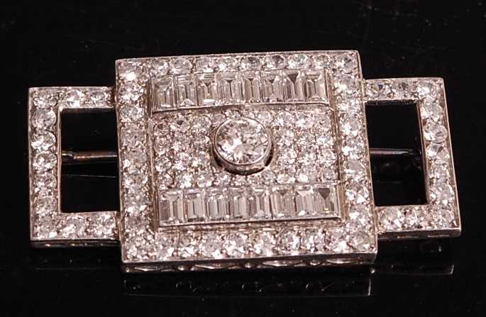 Lot 1108 - A white metal Art Deco diamond panel brooch,...