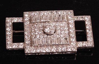 Lot 1108 - A white metal Art Deco diamond panel brooch,...
