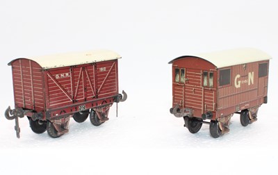 Lot 221 - 1912 Carette GNR goods van (VG) with a 1913...