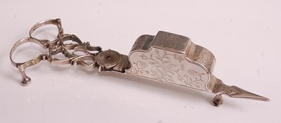 Lot 1060 - A pair of George III silver wick...