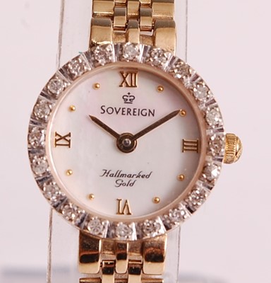 Lot 1169 - A 9ct yellow gold lady's Sovereign diamond set...