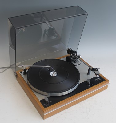 Lot 555 - A Thorens TD 160 turntable, having a teak case...