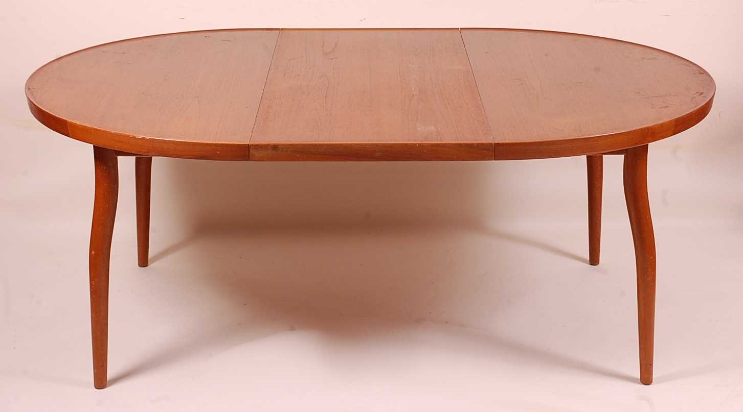 Lot 439 - A 1960s Danish teak extending D-end dining...