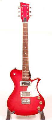 Lot 510 - A First Act ME501 electric guitar, in red...