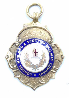 Lot 49 - A 9ct gold hallmarked LMS enamel Winners Medal,...