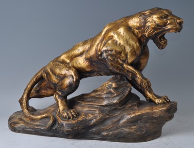 Lot 204 - A large 1930s gilded plaster figure of a...