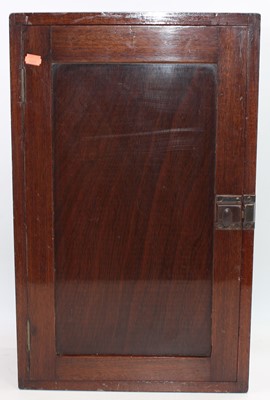Lot 124 - A walnut single door wall cupboard, reputedly...