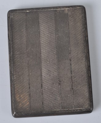 Lot 102 - An Art Deco silver engine turned pocket...