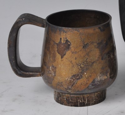 Lot 104 - A 1970s silver squat tankard, having engine...