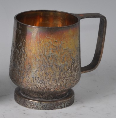 Lot 106 - A 1960s silver squat tankard, having stylised...