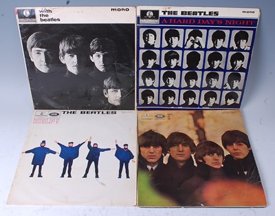 Lot 844 - The Beatles, a collection of six LP's to...