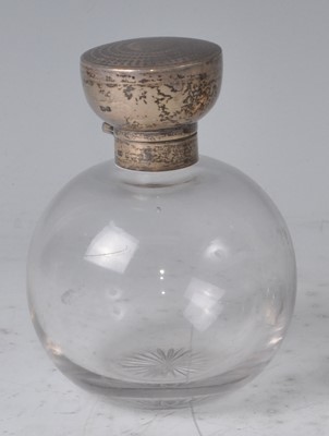 Lot 121 - An Art Deco silver and clear glass bodied...