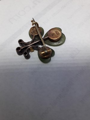 Lot 1138 - A Russian yellow and white metal shamrock...