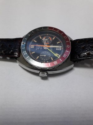 Lot 1163 - A gent's stainless steel Heuer Autavia GMT...