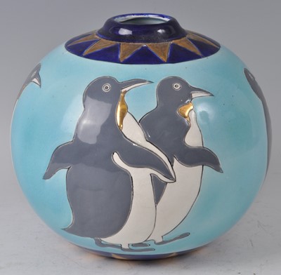 Lot 57 - A 1930s Longwy ceramic penguin vase, of...