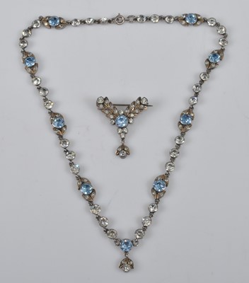 Lot 1132 - An Edwardian white metal paste set necklace...