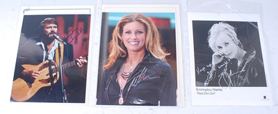 Lot 658 - A collection of seven signed photographs of...