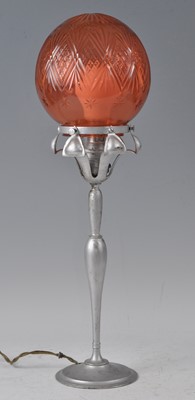 Lot 171 - An Art Deco silvered metal table lamp, having...