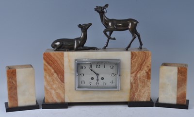 Lot 160 - An Art Deco marble and onyx mantel...