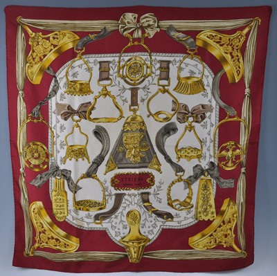 Lot 184 - A vintage Hermès of Paris Etriers silk scarf,...