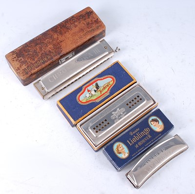 Lot 537 - A Hohner Chromonika III harmonica in original...