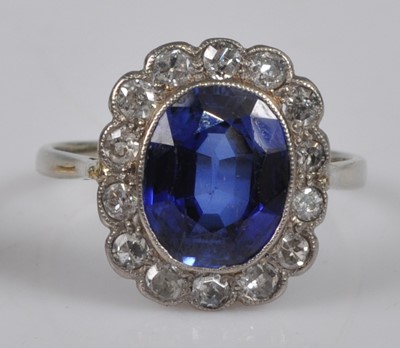 Lot 1118 - A white metal, synthetic sapphire and diamond...
