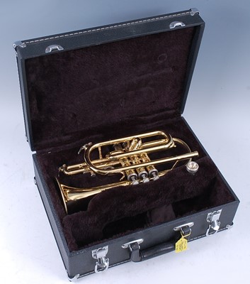 Lot 524 - A Sonata brass cornet, in fitted leather case.