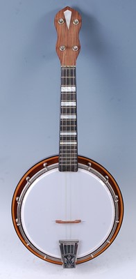 Lot 531 - A Musima ukulele banjo, having a maple back...