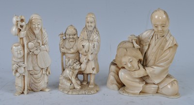 Lot 1238 - A Japanese Meiji period carved ivory okimono...