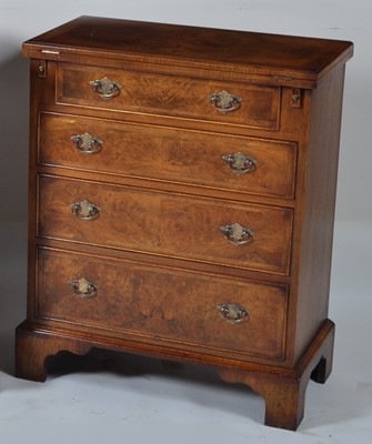 Lot 1361 - A walnut and figured walnut bachelors chest,...
