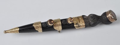 Lot 1116 - A Victorian carved bog oak and yellow metal...