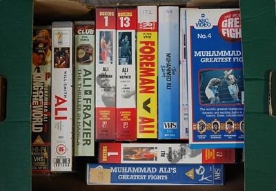 Lot 732 - Four boxes of boxing related VHS cassettes,...