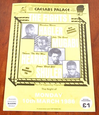 Lot 746 - A folder of boxing programmes, to include The...