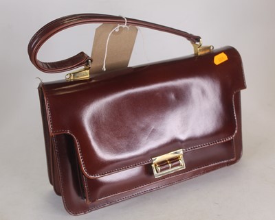 Lot 546 - A lady's Maclar brown stitched leather handbag,...