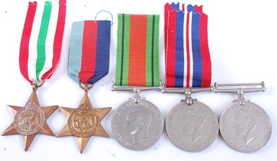 Lot 118 - A collection of five WW II medals, to include...
