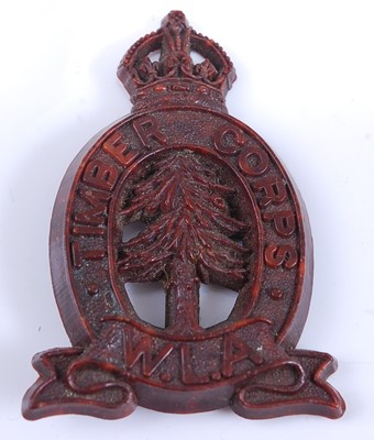 Lot 46 - A WW II plastic economy cap badge for the...