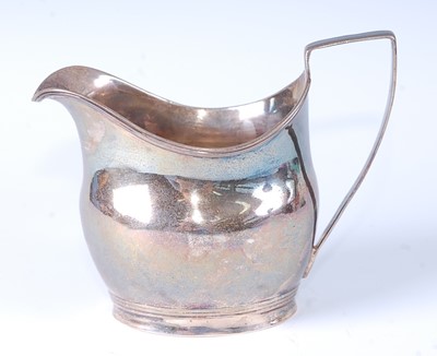 Lot 2125 - * A George III silver cream jug, of helmet...