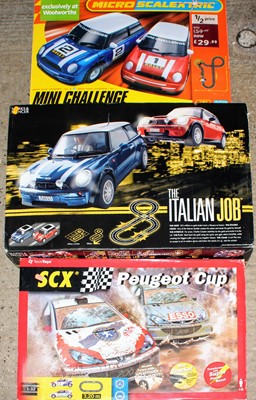 Lot 1407 - A group of 3 racing sets as follows: 
Micro...