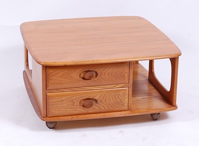 Lot 502 - An Ercol light elm 'Pandora's Box' square...