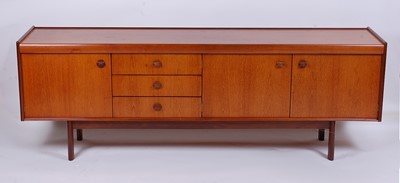Lot 534 - A 1960s teak long sideboard, having...