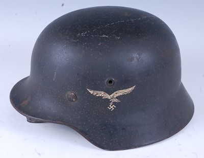 Lot 11 - A German Third Reich M35 Stahlhelm, having...