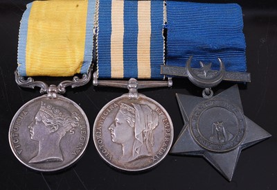 Lot 207 - A group of three campaign medals to include...