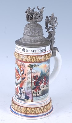 Lot 128 - A German porcelain beerstein, painted and...