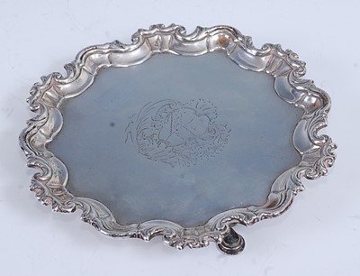 Lot 2159 - A mid-18th century Irish silver card waiter,...