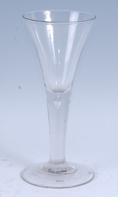 Lot 2245 - * A circa 1750 oversized wine glass, the drawn...