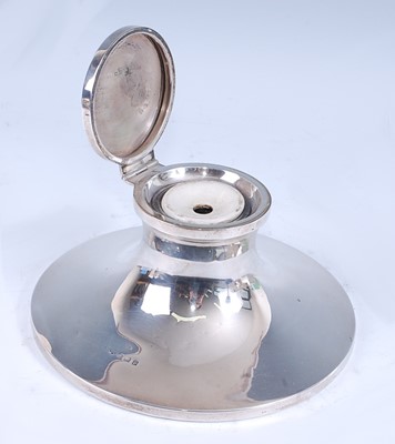 Lot 2168 - A George V silver capstan inkwell, of flaring...