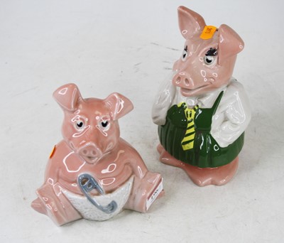 Lot 196 - Two Wade Natwest money-boxes; together with a...