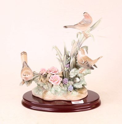 Lot 200 - A Lladro Spanish porcelain model of a trio of...