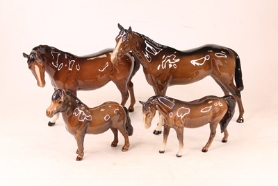 Lot 205 - A collection of four Beswick animal figures,...